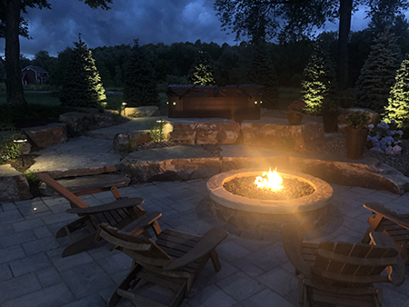 Boulder Firepit and Hot Tub Area with LED Lighting