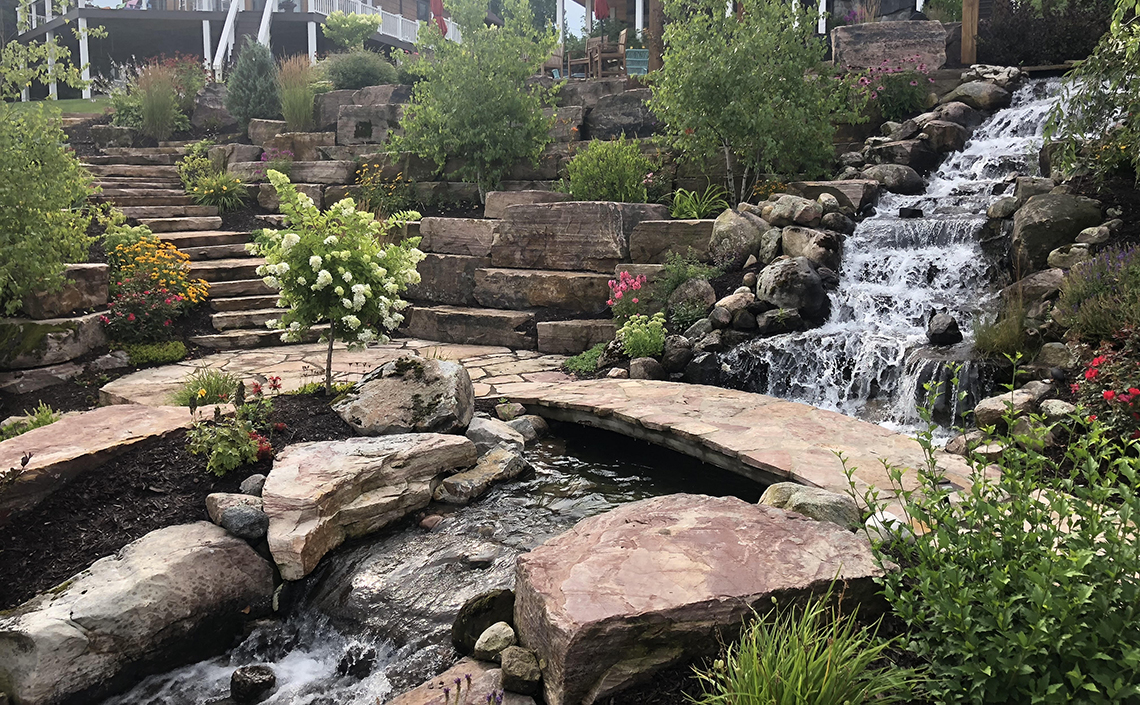 Boulder Terraces with Waterfall Bridge and Sandstone Stairs