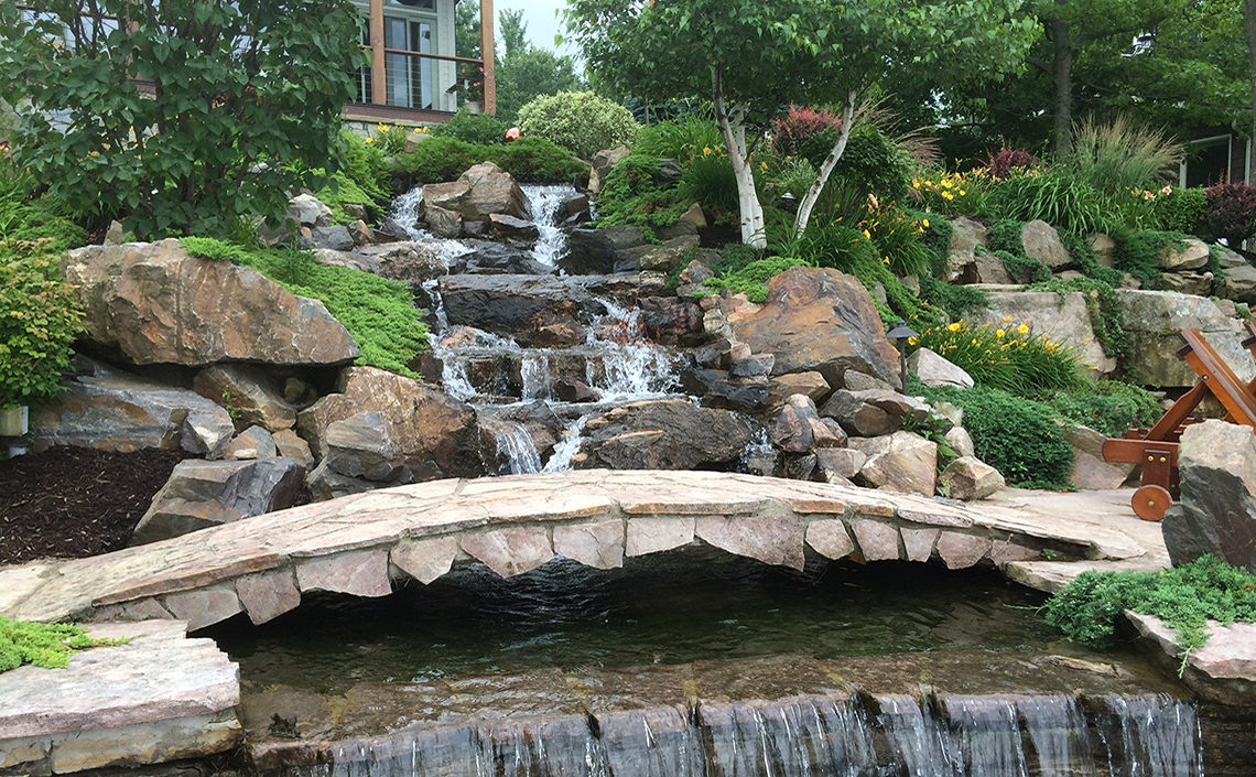 Stone Bridge over Waterfall