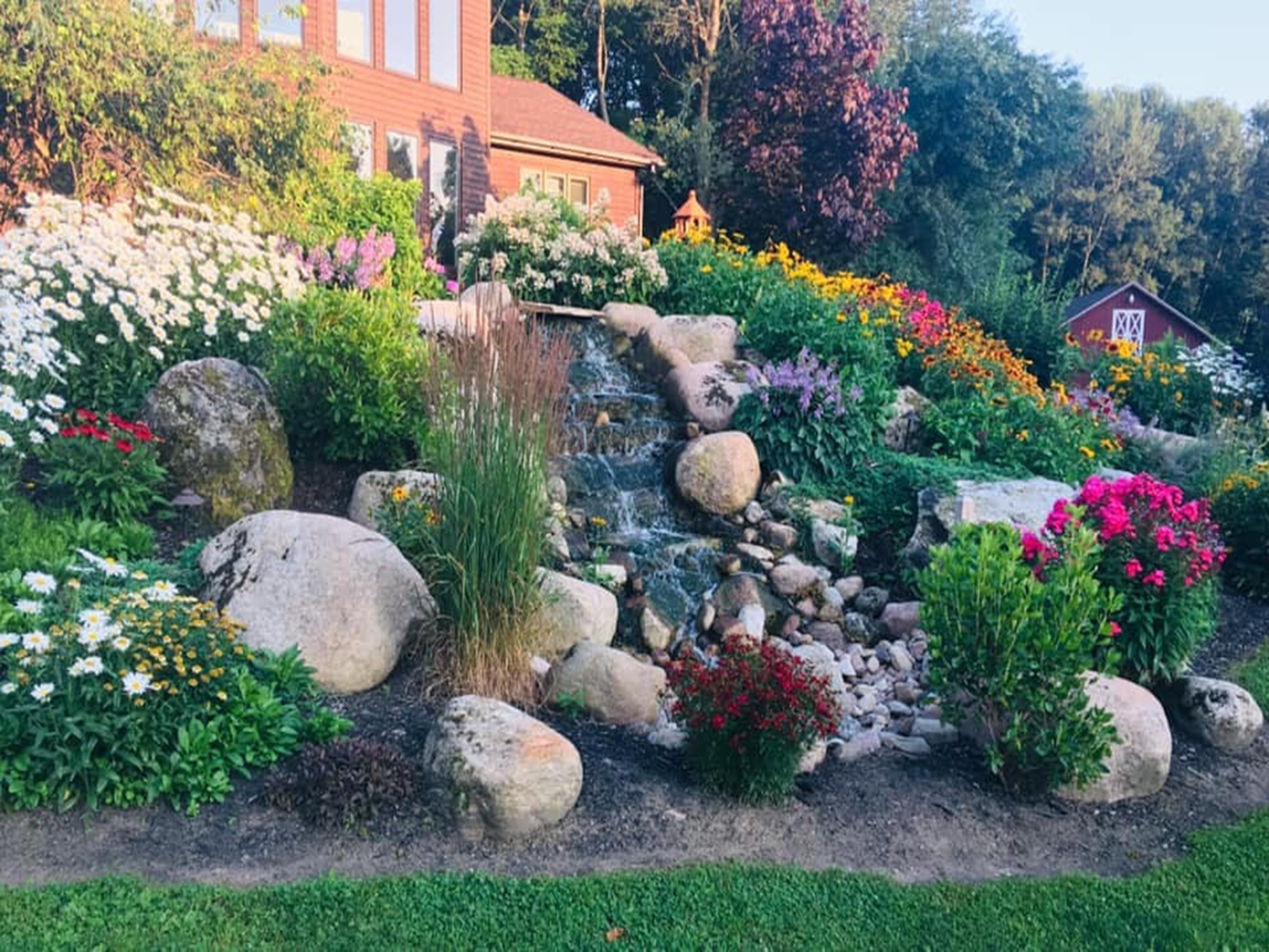 Terraced Hillside with Waterfalls and Plantings