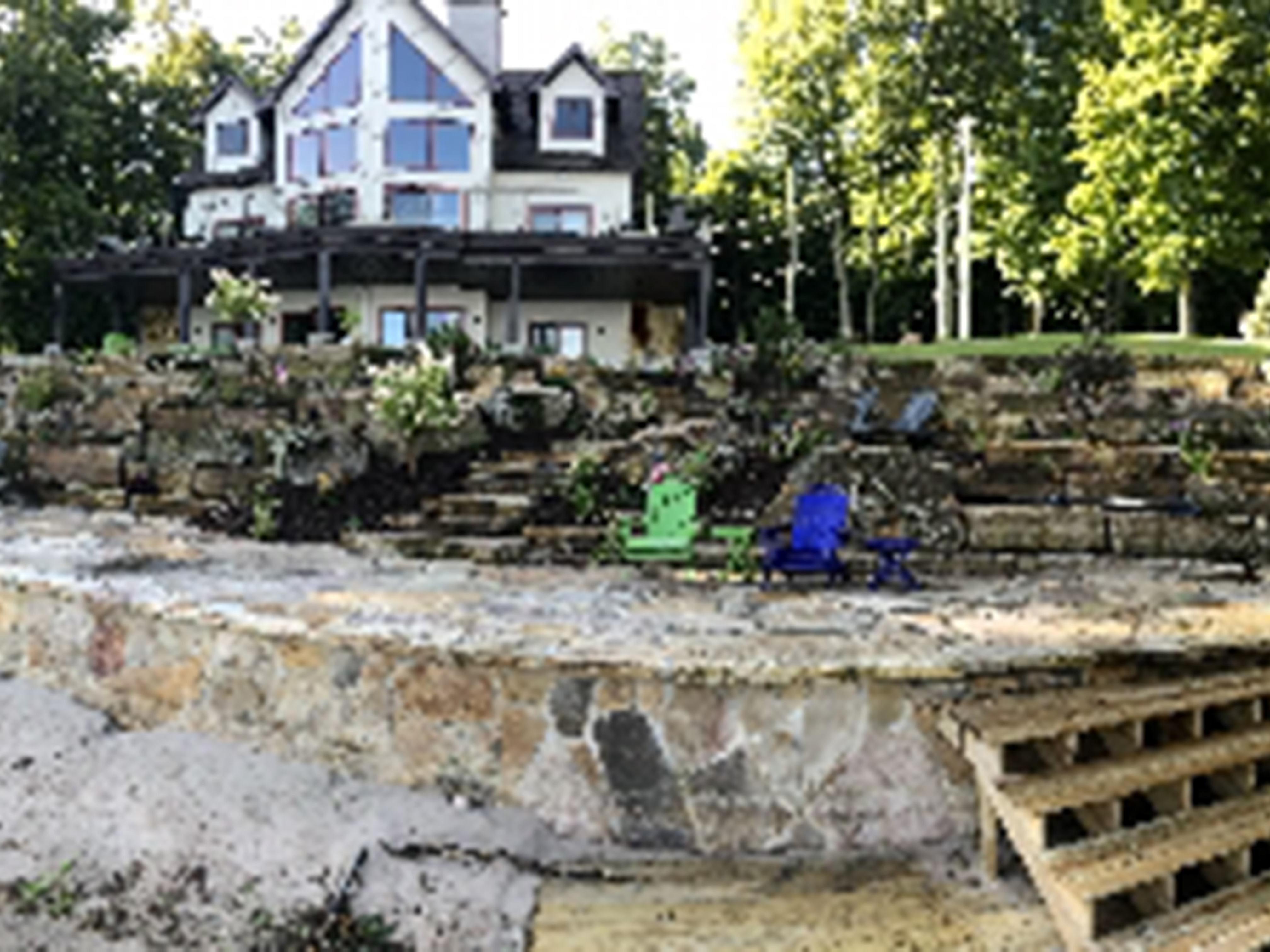 Natural Stone Seawall with Stairs, Boulder Terrace, Patio and Gardens