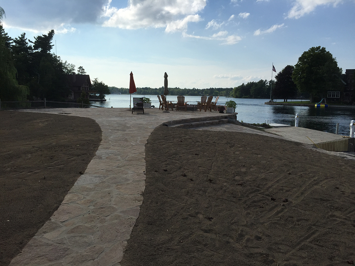 Stone Work Nearly Complete - Lounge Chairs Set to Watch River Traffic