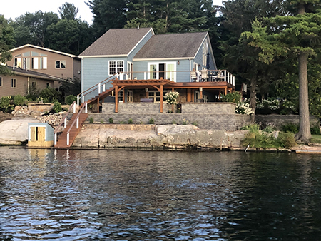 Retaining Wall System with Composite Deck and Stairs