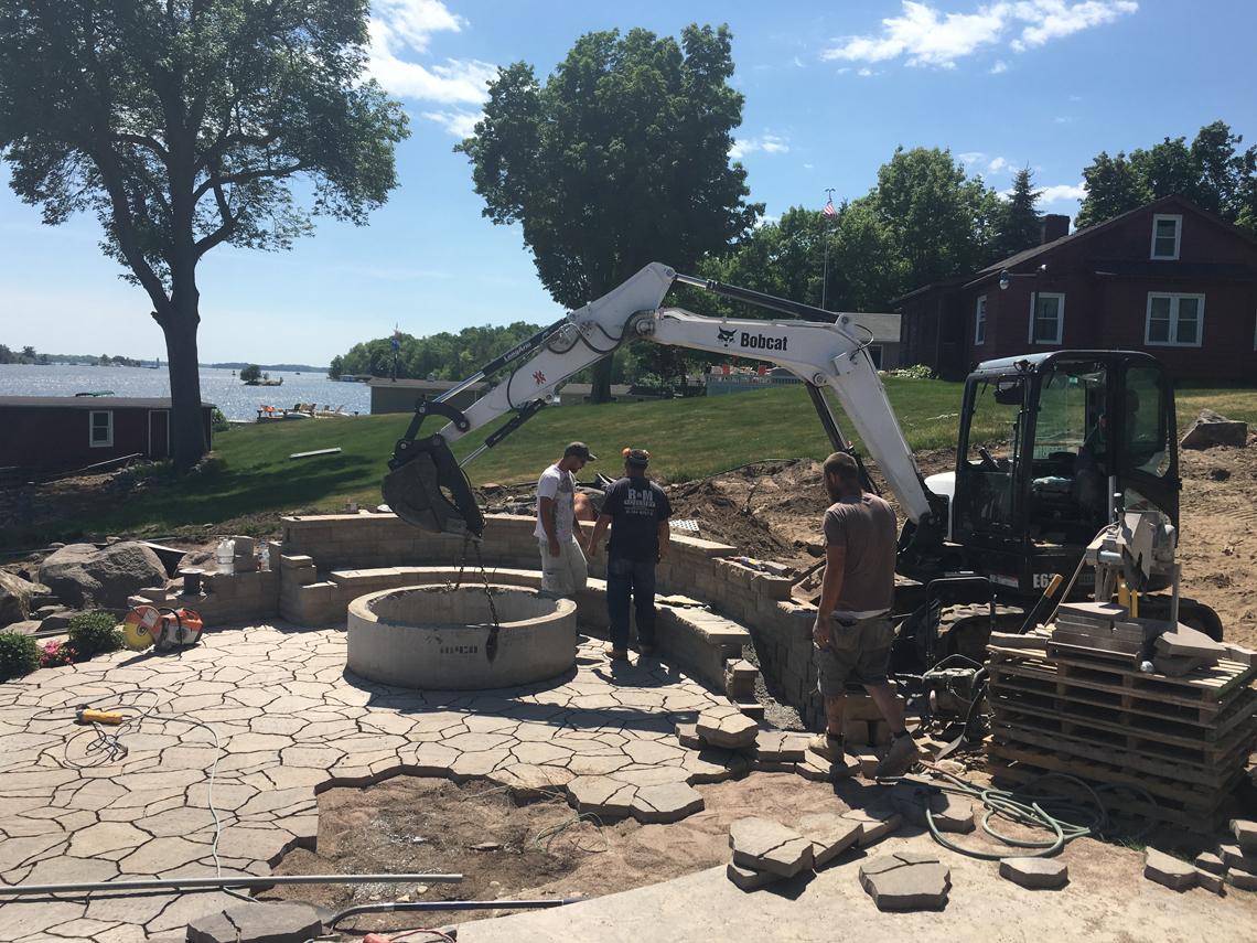 Paver work begins on the driveway